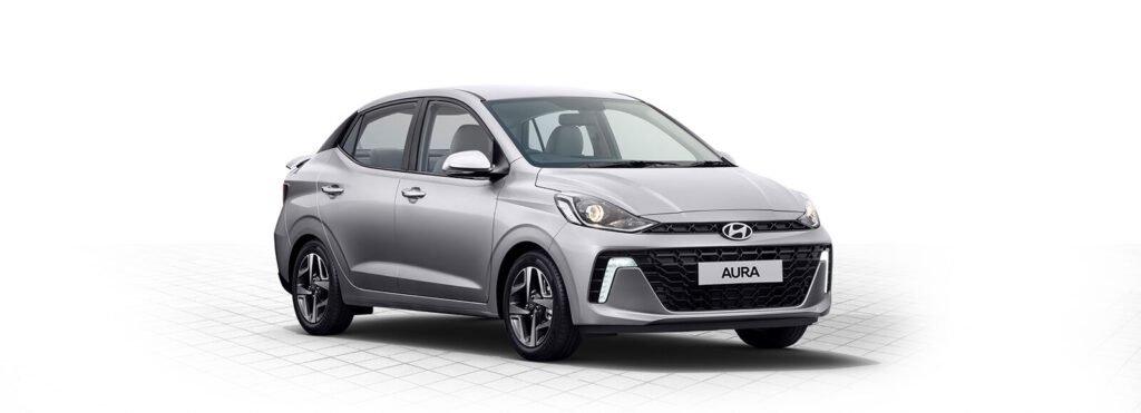 Hyundai Aura S AMT Sedan Front and Side View with LED DRLs and Stylish Design