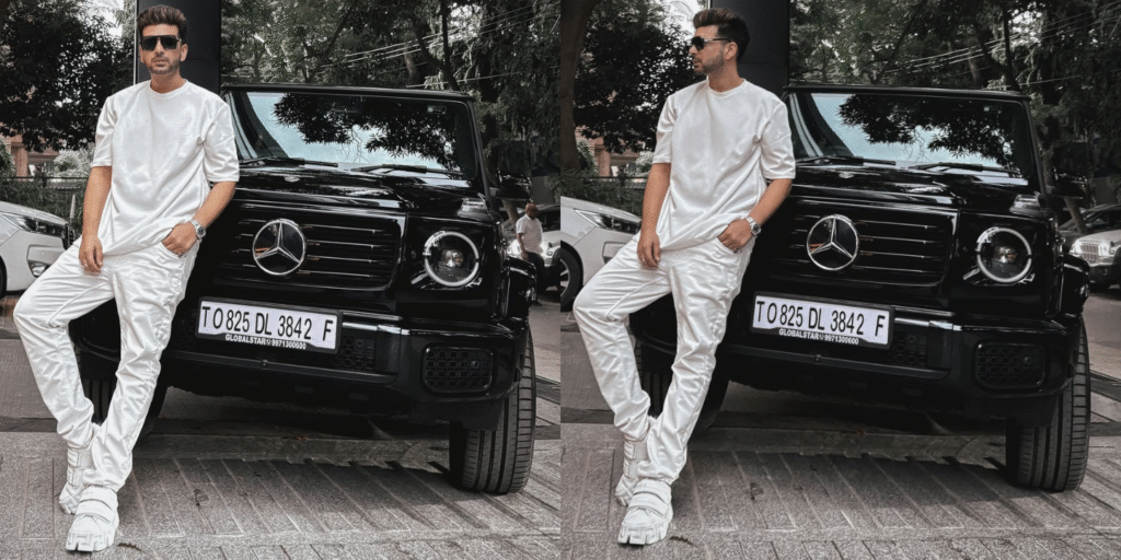 Karan Kundra अपनी नई Mercedes-Benz G-Wagen SUV के साथ पोज़ देते हुए।