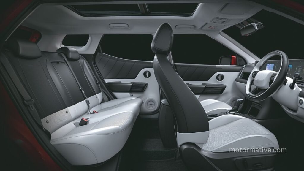 Hyundai Bayon interior featuring a panoramic sunroof, dual-tone cabin and rear seats